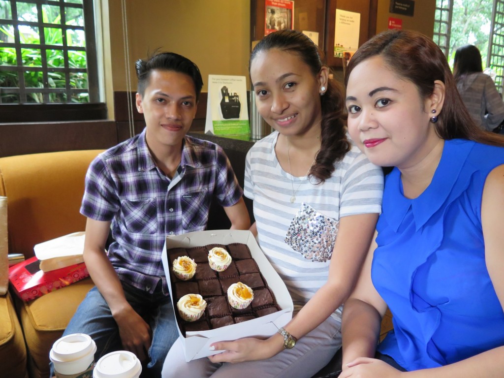 Jeff, Nicole and KC enjoying Melissa's delicious brownies and cupcakes